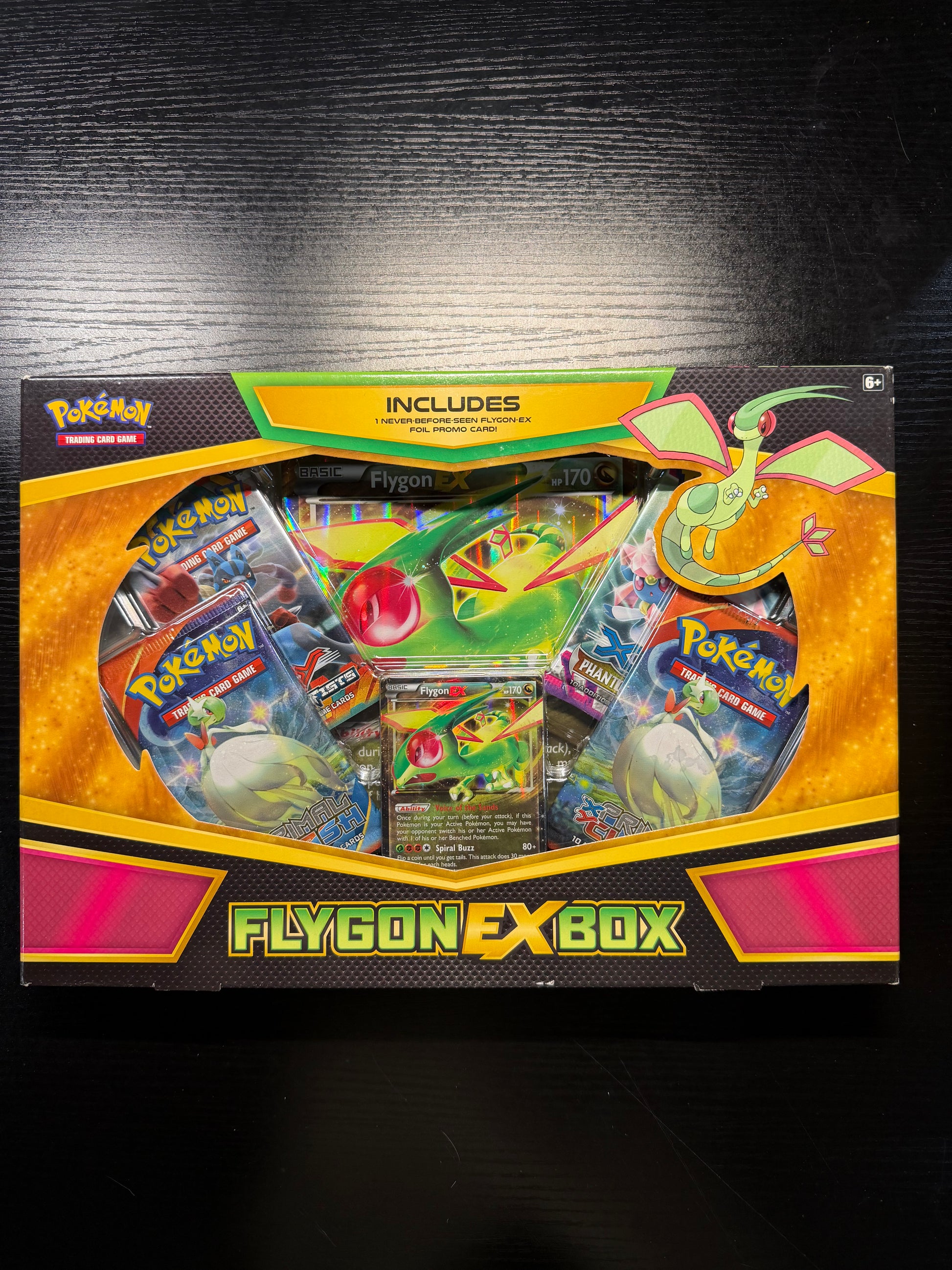 Pokemon TCG: FLYGON-EX Box -4 Booster Packs with A Foil Promo Card and 1 Special Oversize Card